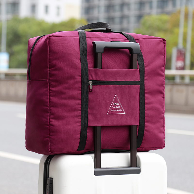 女男旅行包手提袋收纳袋子轻便行李包大容量衣服袋被子收纳袋短途 中 紫色