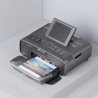 商品佳能cp1300 手机照片打印机