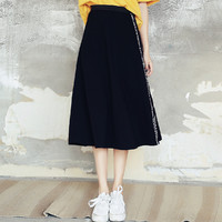 夏季韩版女装学院风松紧腰印花显瘦中长A字半身裙 XS 黑色