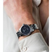 TISSOT 天梭 力洛克系列女表 钢带透明表底罗马数字日历自动机械手表腕表