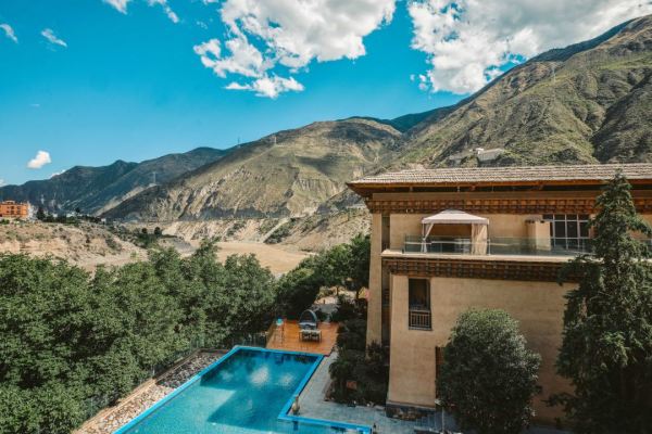 罕见的住二送一周末不加价丽江茶马道丽世酒店4店2晚连住通兑含双早