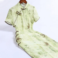 戚薇改良夏季旗袍2024年轻款少女日常可穿复古国风修身连衣裙 绿色 S