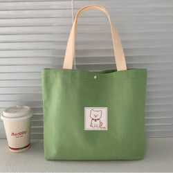 绘季 帆布包女2024年新款加大容量简约小布袋上班族通勤包包迷你手提