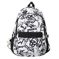 卡帝乐鳄鱼 涂鸦男生双肩包旅游出行大容量背包初中高中女书包