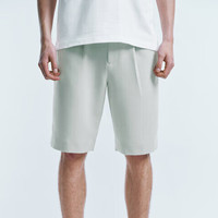 URBAN REVIVO 男士潮流休闲通勤百搭纯色褶饰短裤 UMU640032 白绿 34