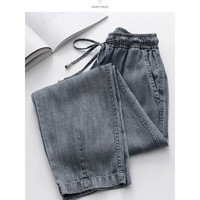 】高档轻奢品牌2022夏季薄款天丝牛仔裤女松紧腰九分冰丝萝卜裤哈伦裤宽松女裤子 烟灰7分裤 5XL适合190斤-210斤