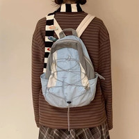 星昔户外登山包双肩包休闲运动包撞色小书包轻便旅行包轻薄徒步小背包 冰川蓝小号