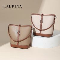 L＇ALPINA 阿尔皮纳袋鼠 LALPINA高级质感真皮拼色小水桶包新款通勤休闲女士单肩斜挎女包