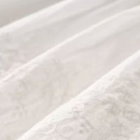 子牧棉麻2024夏装 女文艺百搭半身裙刺绣a字裙半截裙女中长款复古裙子3178 白色 XL(125-140斤)